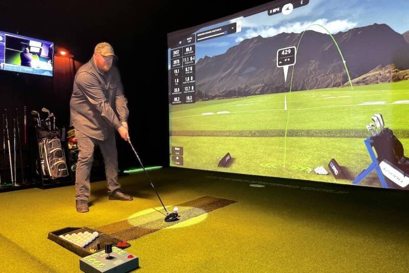 Man Turns Garage into Golf Simulator Business: The Future of Indoor Golf